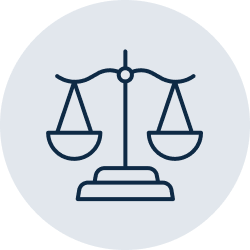 A dark blue balance scale icon centered on a light blue-gray circular background.