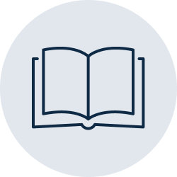 A dark blue open book icon centered on a light blue-gray circular background.