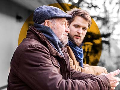 A son talking to his father