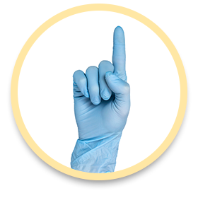 A gloved hand holding up one finger.