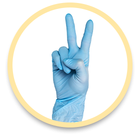 A gloved hand holding up two fingers.